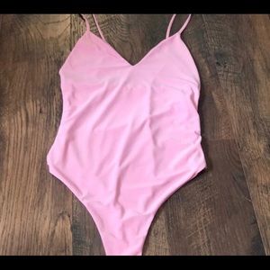 pink bodysuit